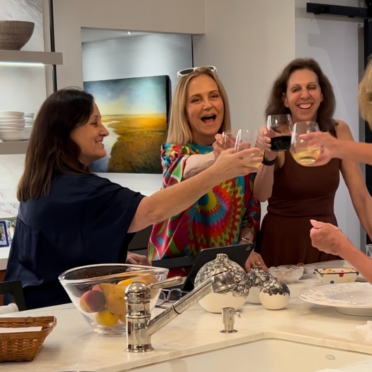 Women saluting with a glass of wine